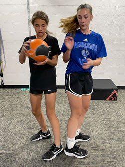 Two Girls With the Medicine Ball